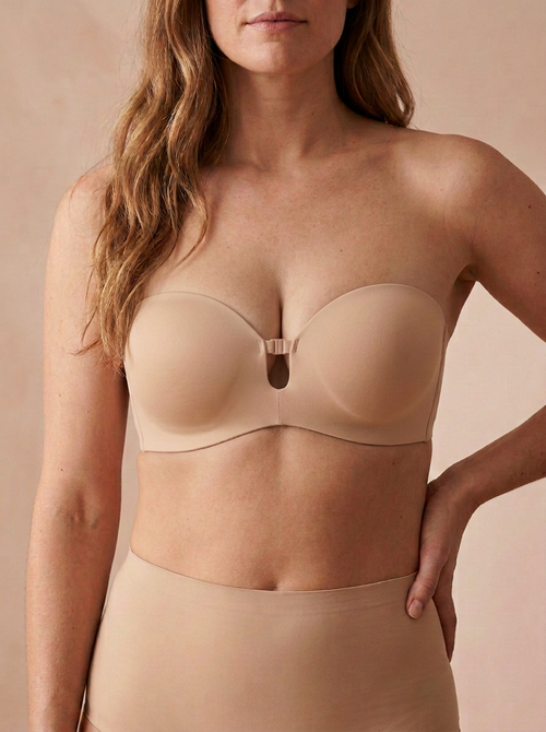Strapless front closure push-up bra in nude on model – Nuvella Glow