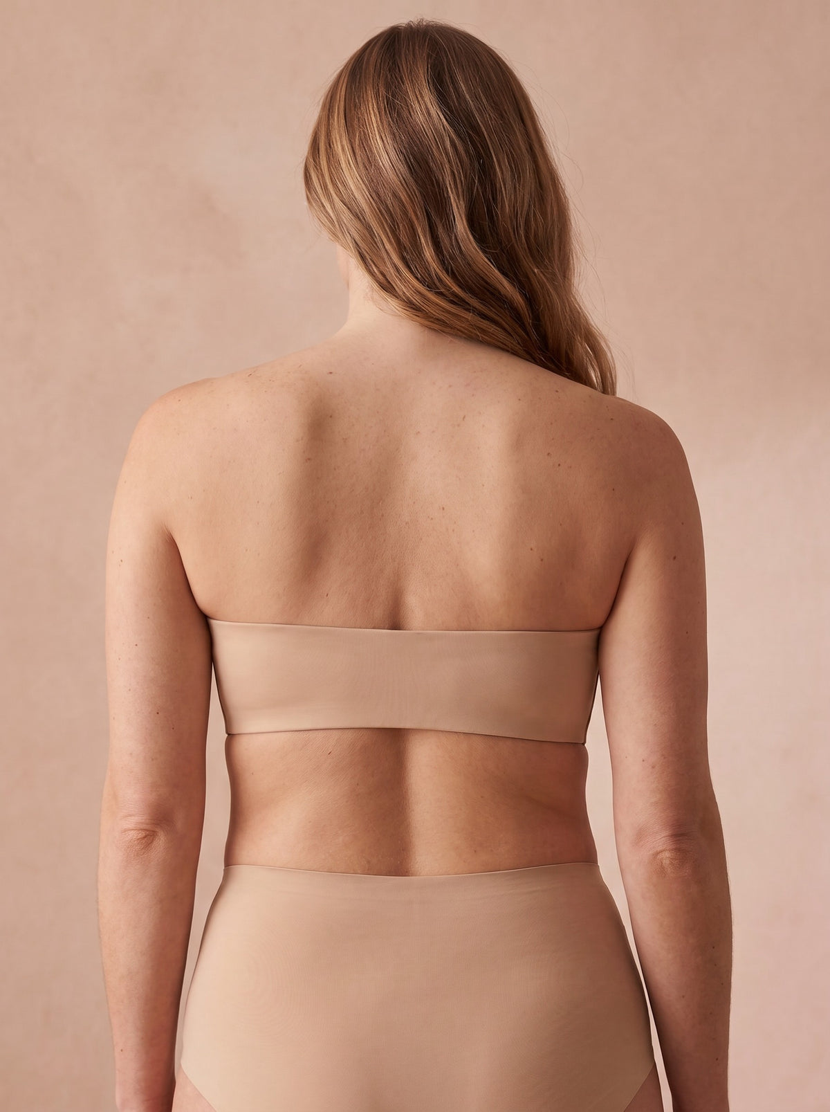 Strapless front closure push-up bra in nude, back view with smooth seamless band – Nuvella Glow
